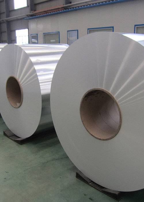 rolls of aluminum in a warehouse