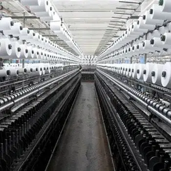 a large machine with rolls of paper