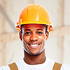 a man wearing a yellow hard hat