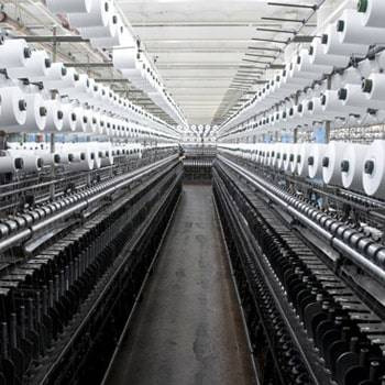 a large machine with rolls of paper